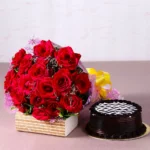 2 Dozen Roses with Chocolate Cake gift combo featuring fresh red roses and a 2 lbs chocolate cake in Karachi.
