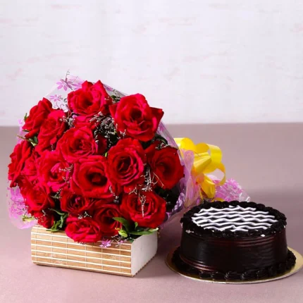2 Dozen Roses with Chocolate Cake gift combo featuring fresh red roses and a 2 lbs chocolate cake in Karachi.