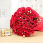 50 fresh red roses with 16 Ferrero Rocher chocolates arranged beautifully for romantic gifting in Karachi.