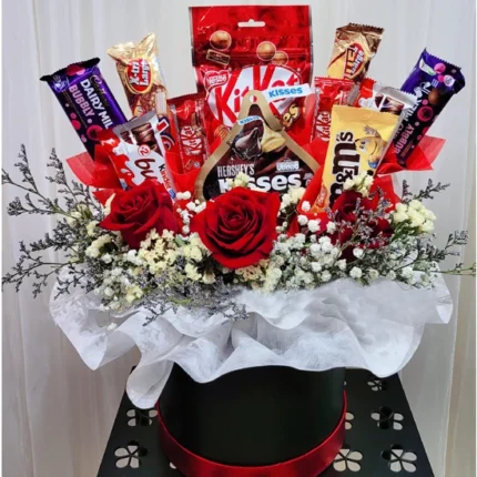 Chocolate Box With Imported Rose featuring KitKat, Kinder, Hershey's Kisses, M&M's, Dairy Milk Almond, and fresh imported roses.