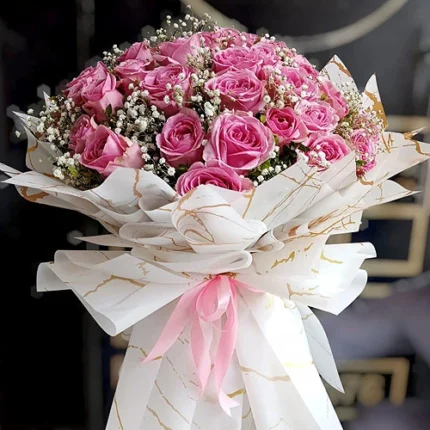 Pink Elegance Rose Bouquet with 50 fresh imported pink roses, Gypsophila flowers, premium bouquet wrapping, and elegant ribbon.